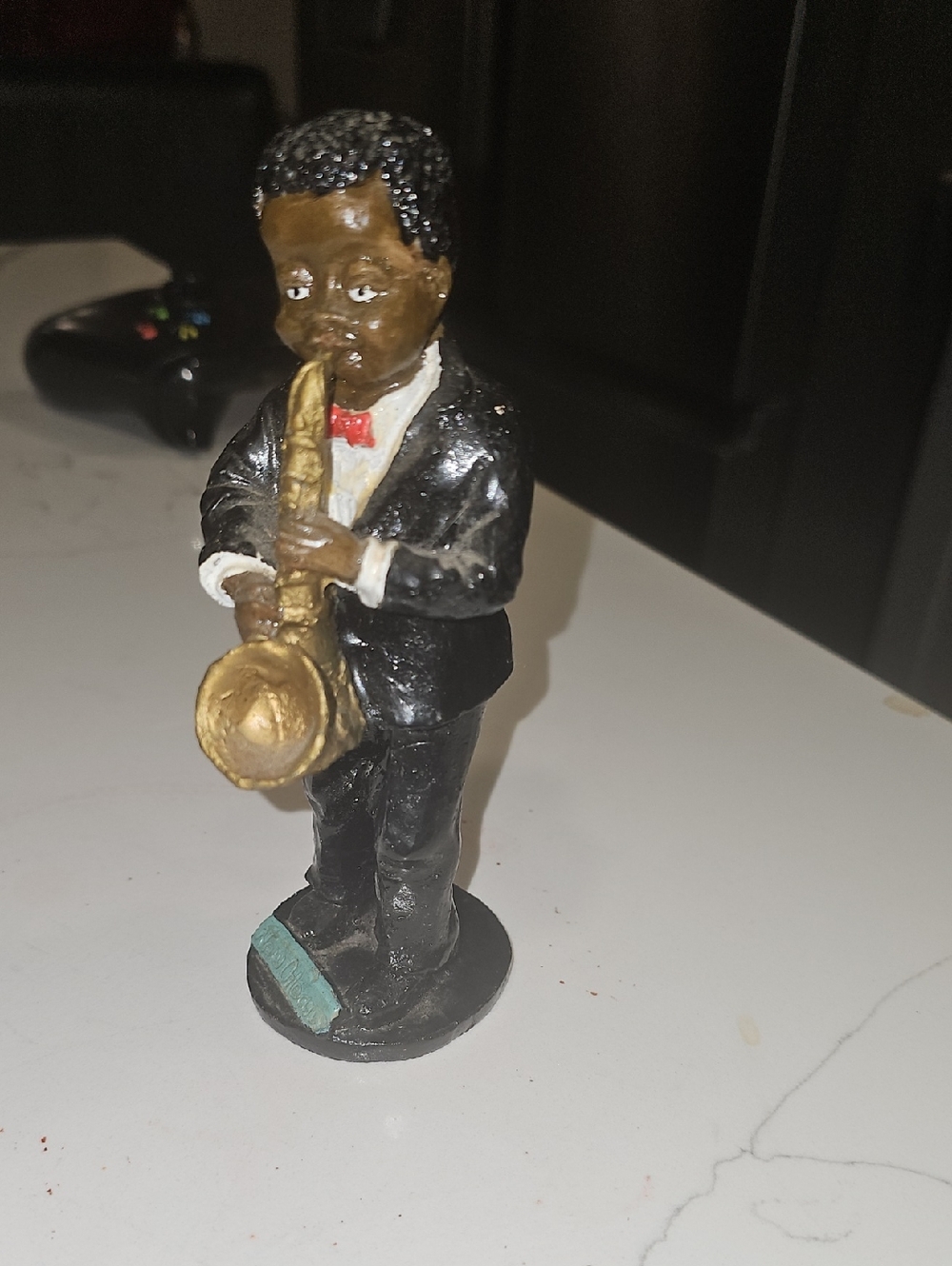 Saxophone Player Figurine in Black, Gold and Red